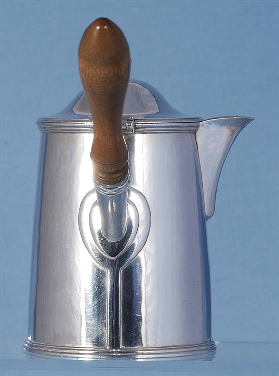 A George V Arts & Crafts silver hot milk jug, by Henry George Murphy, height 163mm, gross weight 15.4oz/481grms.